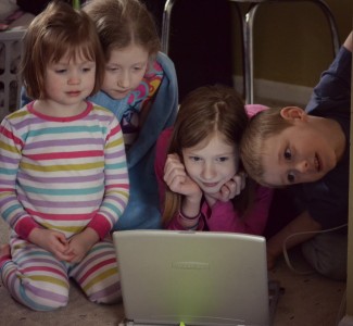 gathered around the screen