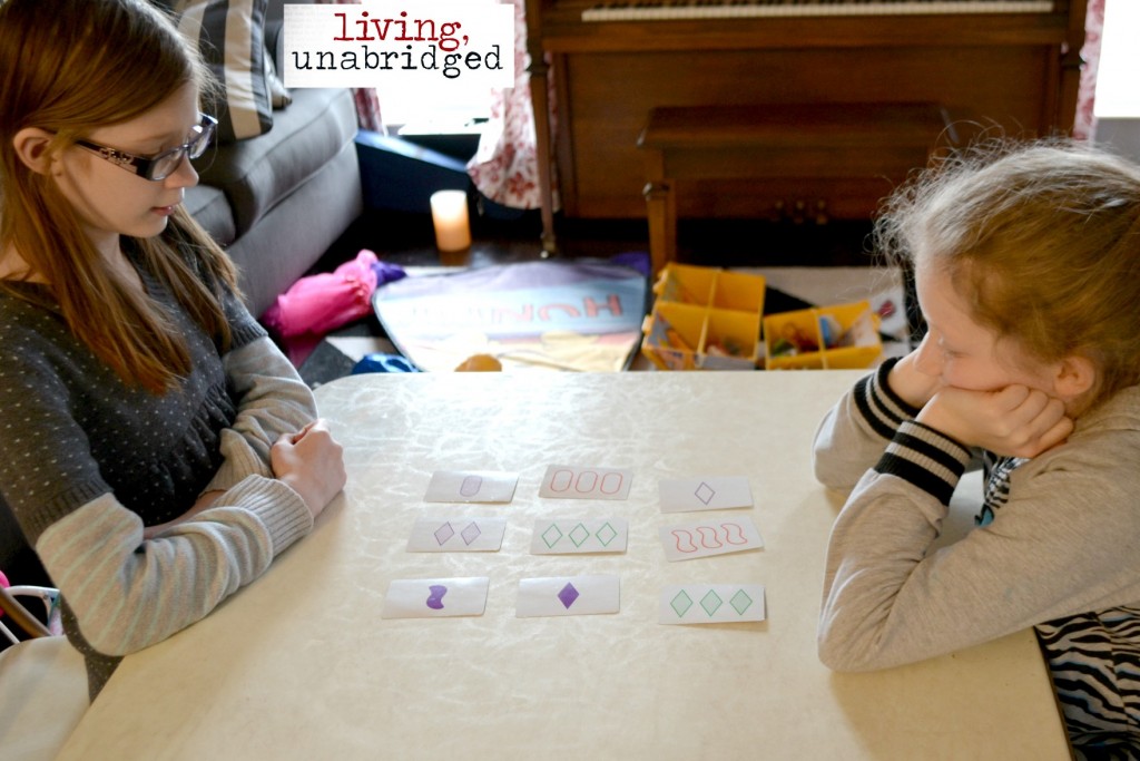 girls playing set card game